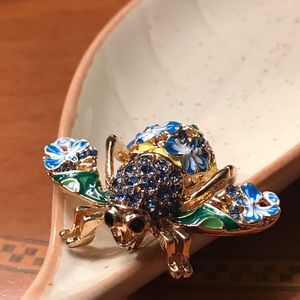 Joan Rivers blue floral bumblebee pins